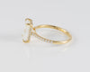 Anillo de compromiso halo oculto oro amarillo 18k con moissanita 3 ct