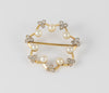 Broche antiguo en oro amarillo 18k con perlas y diamantes