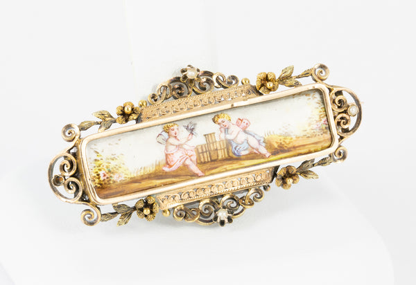 Broche antiguo en oro amarillo 18k y porcelana