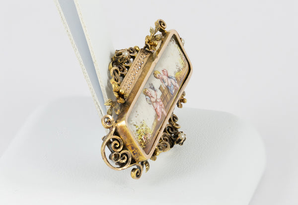 Broche antiguo en oro amarillo 18k y porcelana